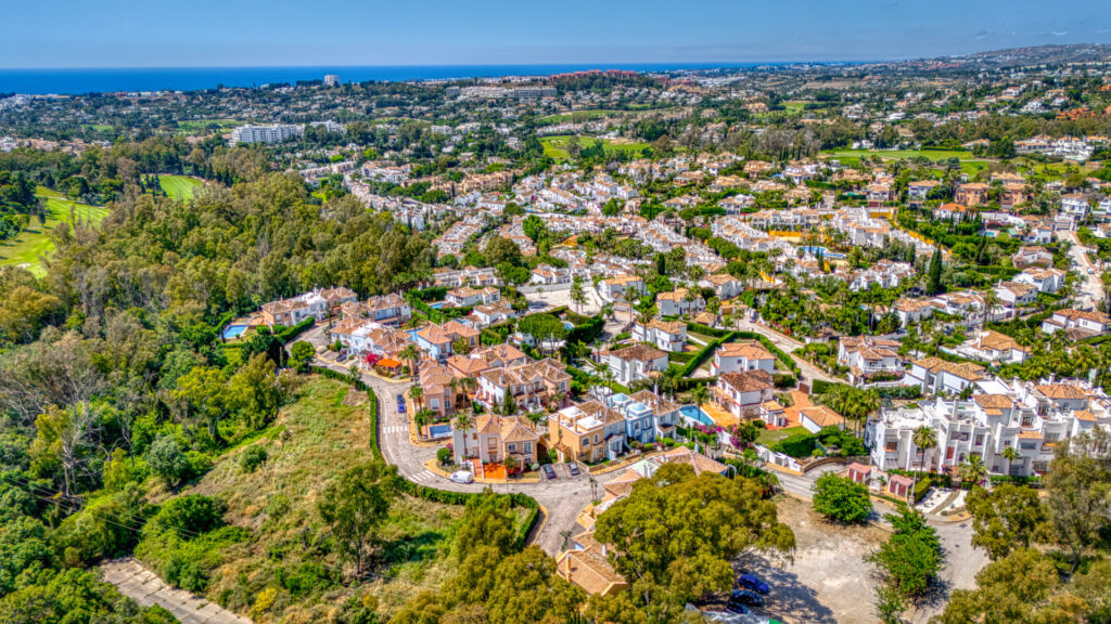 Elegant two bedroom, south west facing townhouse set within an exclusive gated community of Nueva Andalucia, Marbella In Aloha Lake Village