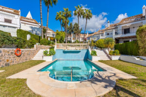 South-facing four-bedroom townhouse located in the gated community of Montepiedra , Nagueles within the Golden Mile, Marbella