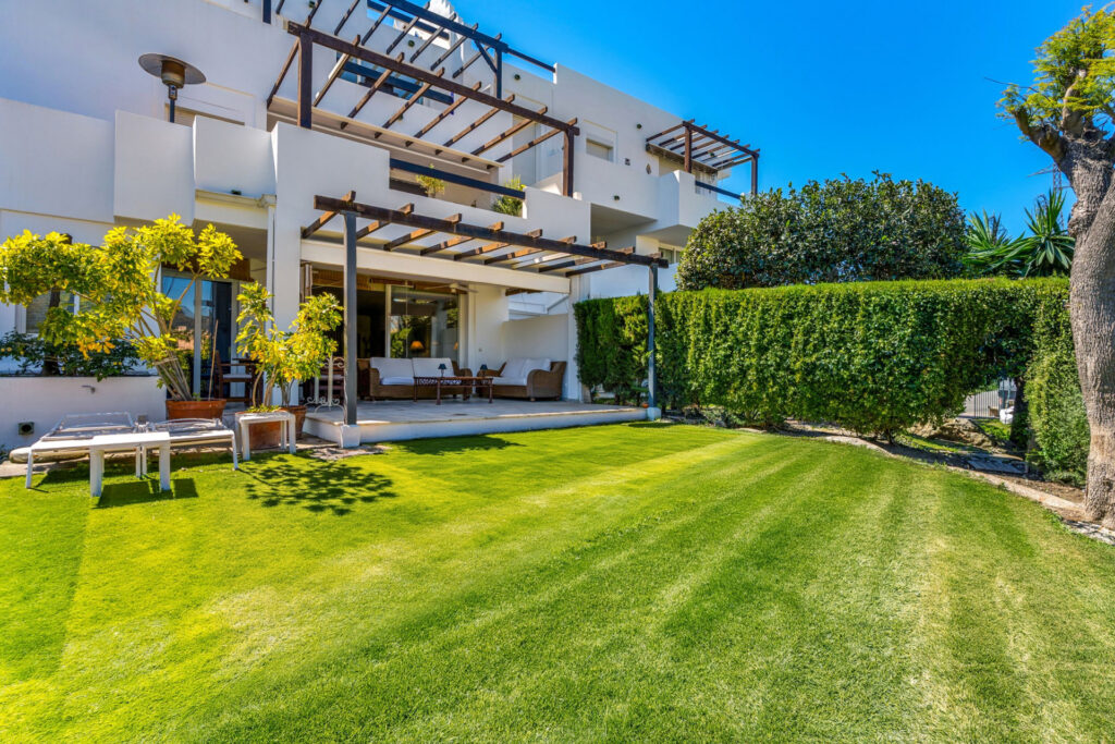 Spacious three-bedroom ground floor apartment situated in the gated community of Las Jacarandas, Bel Air In Las Jacarandas