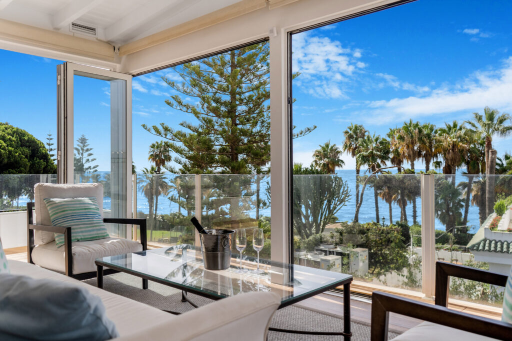 Beautiful frontline beach, four-bedroom end townhouse in the prestigious community of Marbellamar, on Marbella Golden Mile In Marbellamar